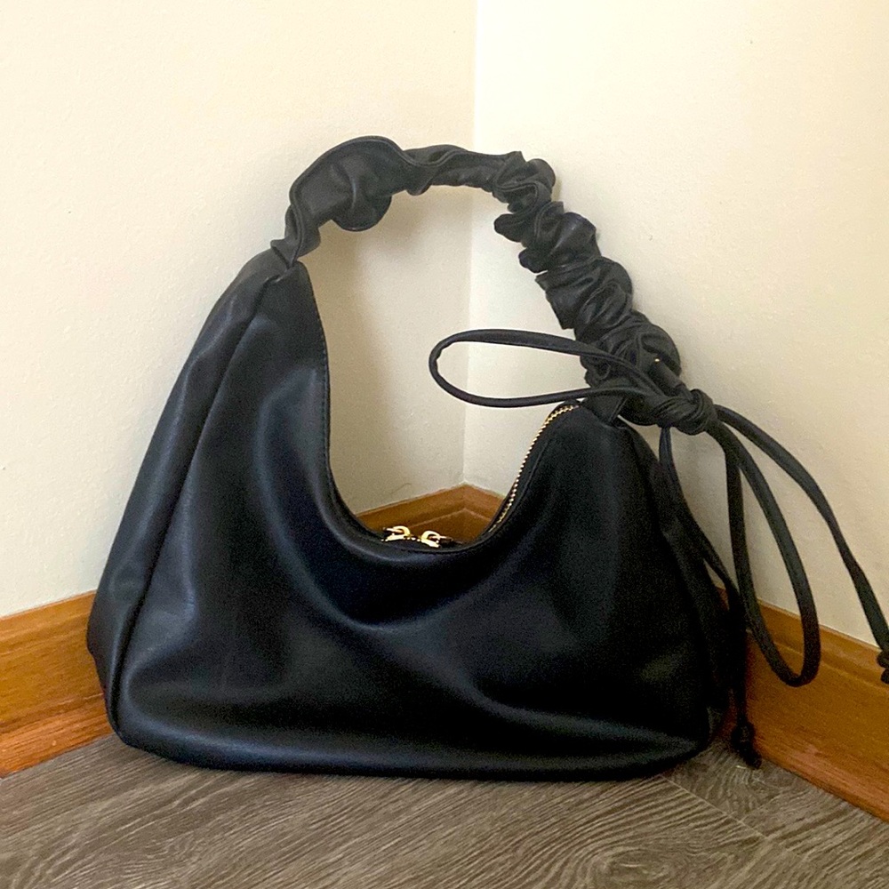 DRAWSTRING HANDBAG